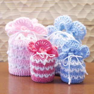 やさしい骨壷カバー　しましまピンク　作家さん手作りのぬくもりある骨壷カバー　洗えるニット　骨袋　ペット骨壷や赤ちゃんのお骨壷に